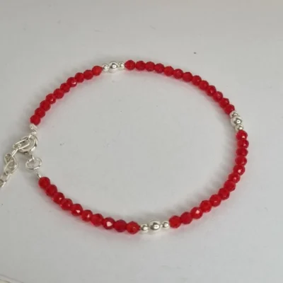 PULSERA CON PIEDRAS NATURALES DE HOWLITA