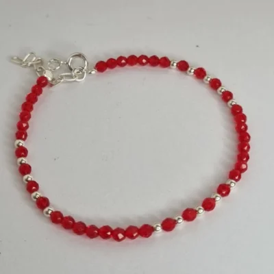 PULSERA CON PIEDRAS NATURALES DE HOWLITA