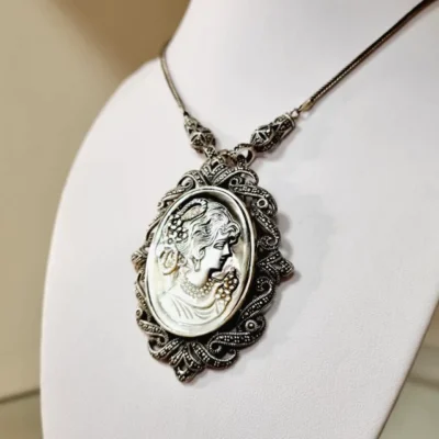 ANTIGUO BROCHE PENDEDOR PLATA Y MARQUESITAS NUDO