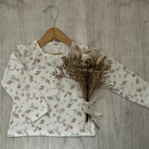 REMERA MORLEY FLORES BLANCA
