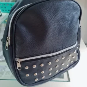 Mochi doble cierre tachas — Anacletta Accesorios, Bahía Blanca