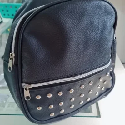 Mochi doble cierre tachas — Anacletta Accesorios, Bahía Blanca