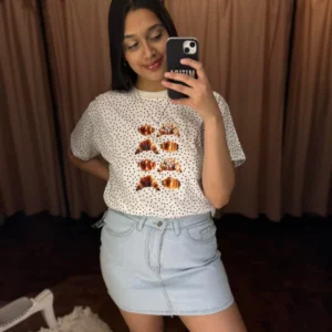 REMERA MEDIALUNA ESTAMPA FACTURAS BLANCA LUNARES NEGROS