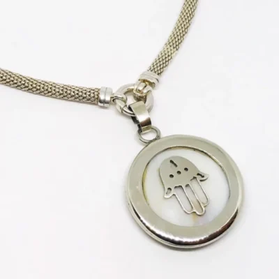 DIJE COLGANTE ART DECO CON RUBI OVAL PLATA Y ORO 18 cod:9261 COLOMBIA — Joyería Debernardi, Bahía Blanca