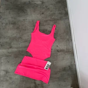 Body Fluo musculosa — Pipina Showroom, Bahía Blanca
